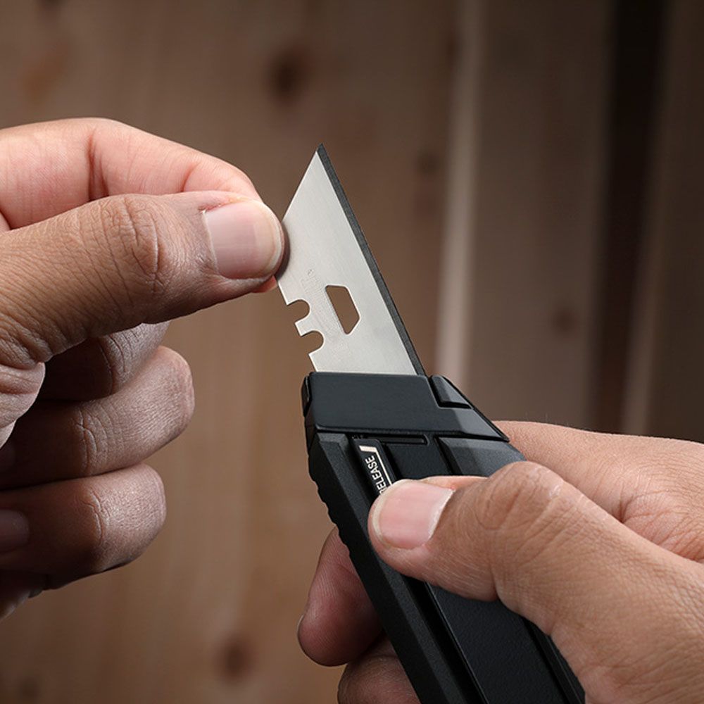 Cúter recargable con 5 + 5 hojas